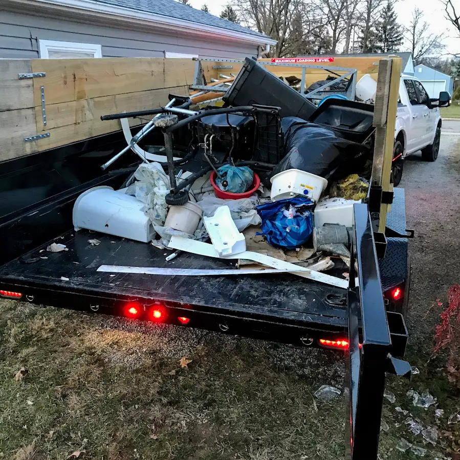 Roll-off dumpster delivered to a residential driveway in Ewing